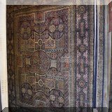R21. 100% Wool handwoven rug with Celtic knot design. Made in India. 7'111” x 10'4”